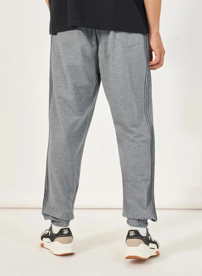 Styli Side Pintucks Oversized Joggers with Embroidered Detail