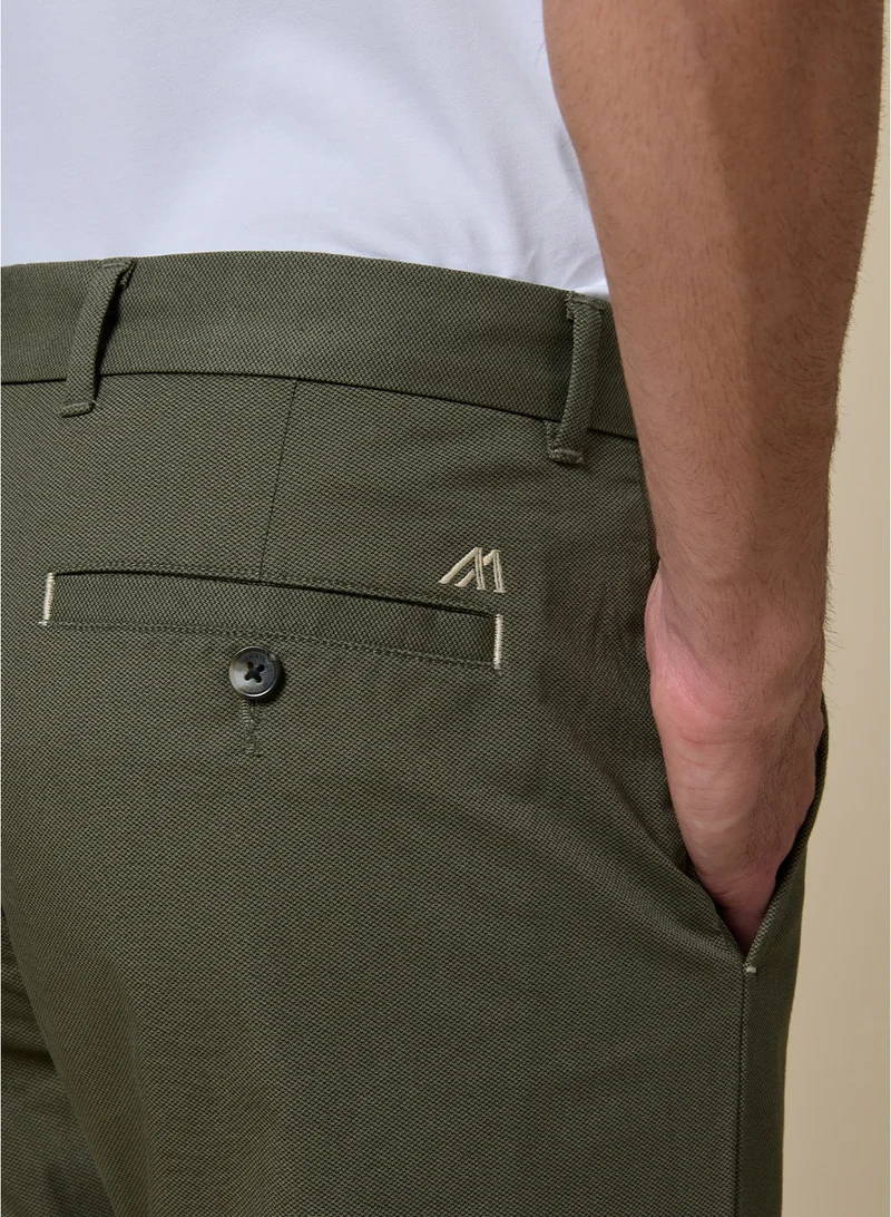 MANNERISM  The Earthway Olive Green Stretch Twill Chinos Comfort Fit for Men | Best Price UAE