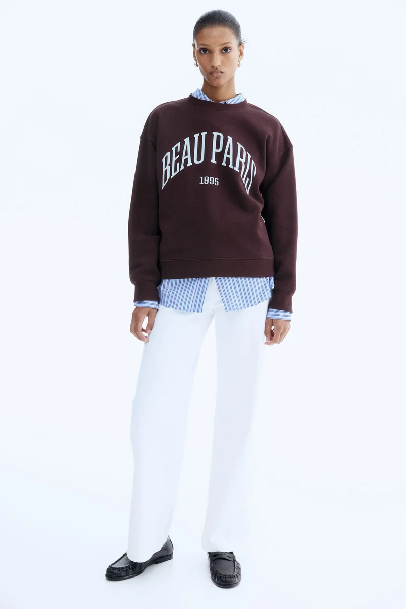 اتش اند ام سويت شيرت مزين بطبعة عبارة