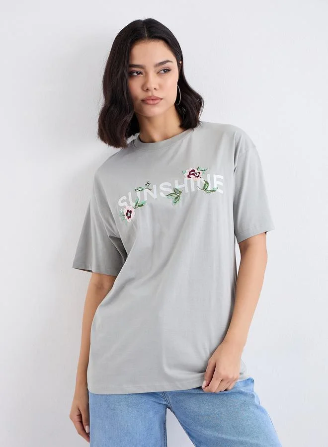 ستايلي Styli Embroidered Slogan Short Sleeves Oversized T-Shirt