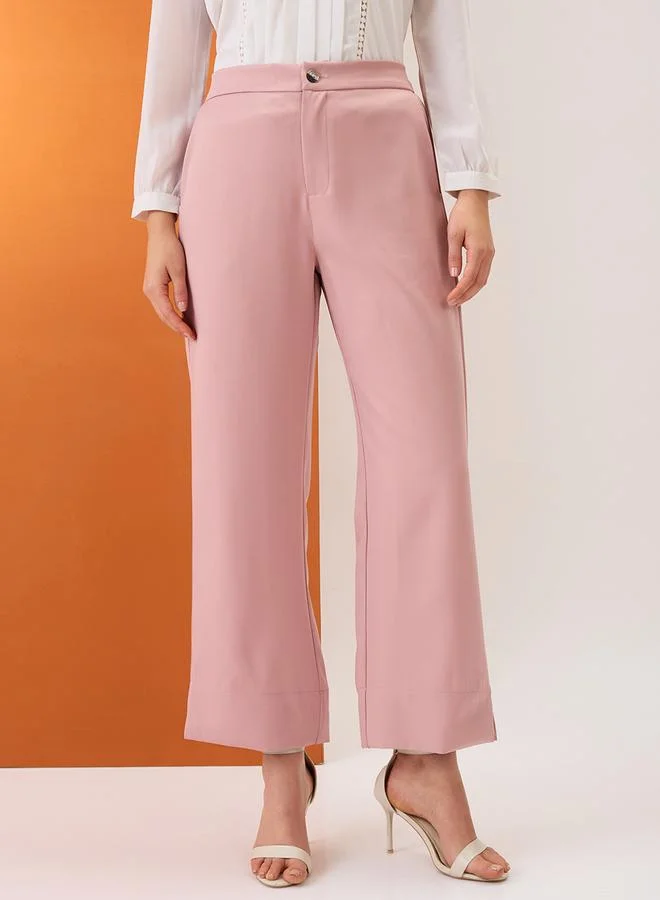 جلو باص بنطال سادة بقصة مريحة وخصر متوسط