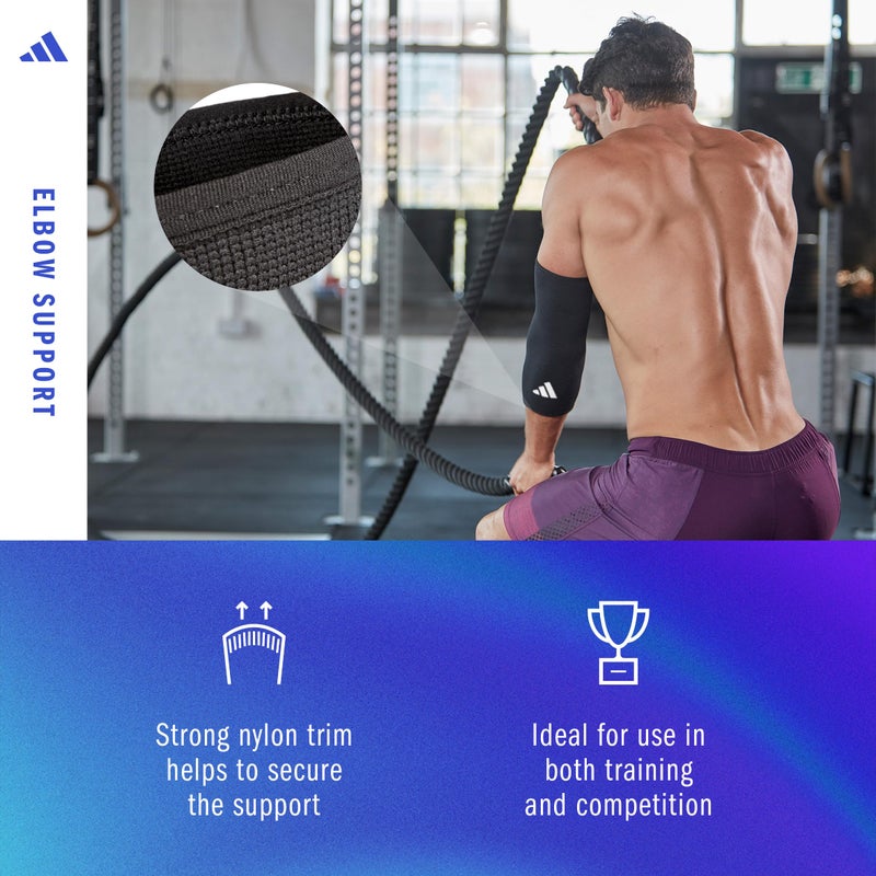 اديداس كم دعم الكوع من adidas - دعم سلس وسلس للكوع لمسابقات التدريب واللياقة البدنية العامة - تصميم مريح من النايلون - متين وقابل للتنفس - أسود (شعار أحمر) كبير - Image 3