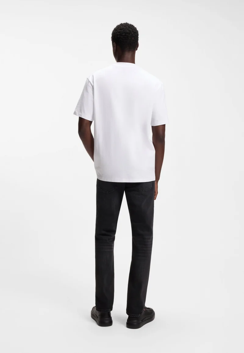 هوجو جينز بقصة نحيفة جداً من دنيم أسود مطاطي