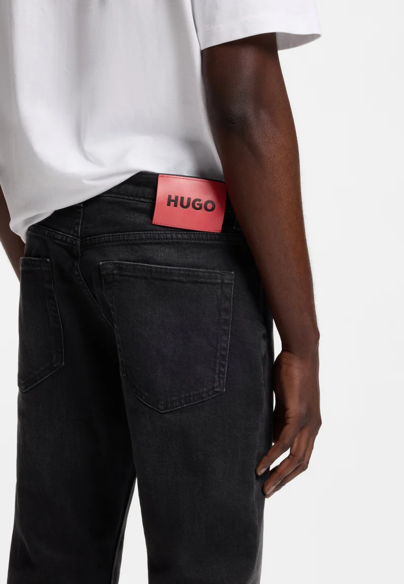 HUGO Black Extra-slim-fit jeans in black stretch denim for Men | Best Price UAE