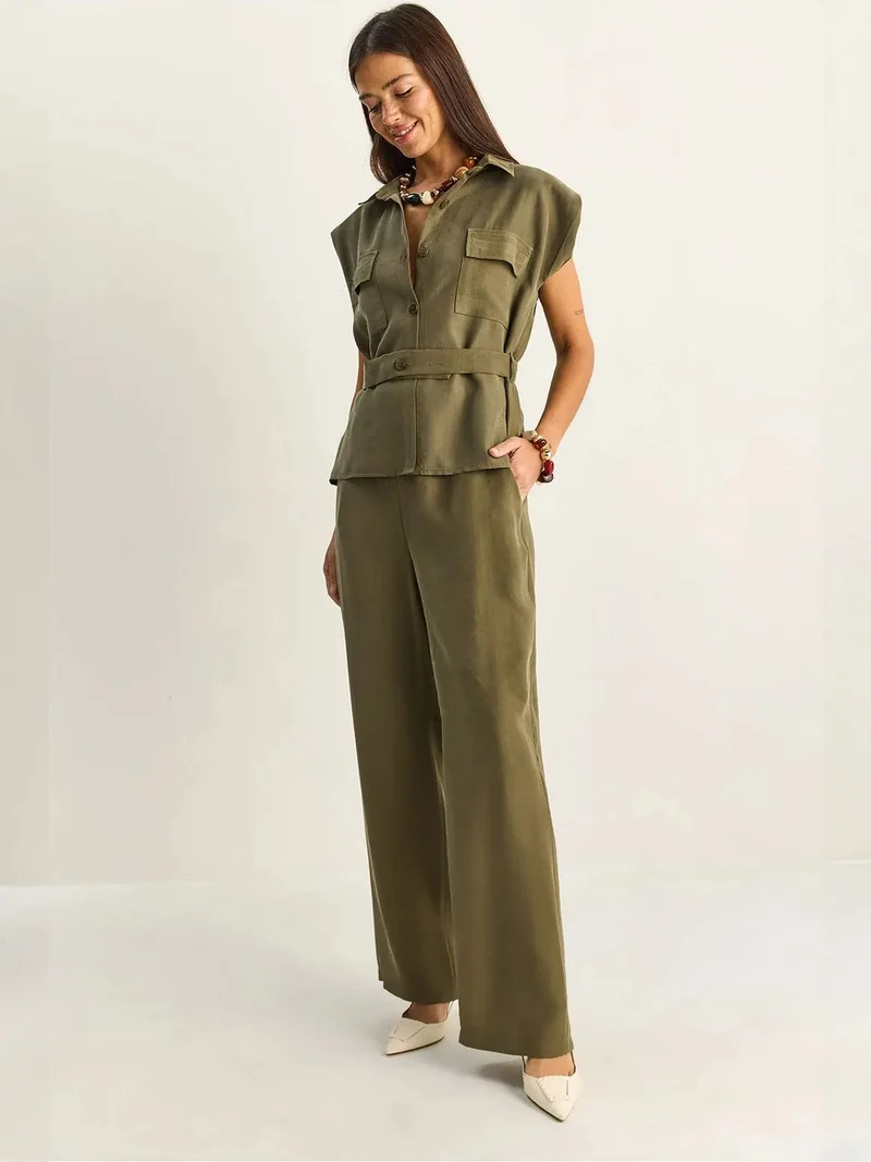 بيانكو لوتشي LUCCI Belted Sleeveless Blouse And Wide-Leg Trousers Set