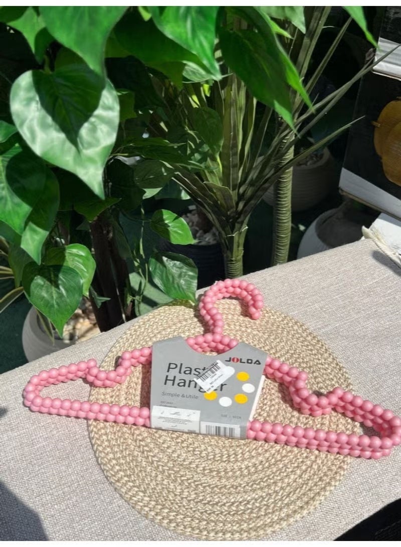 Luxury 3-piece plastic hanger set in pearl pink – elegant design for organizing clothes and a touch of sophistication that adds elegance to your wardrobe - Image 1