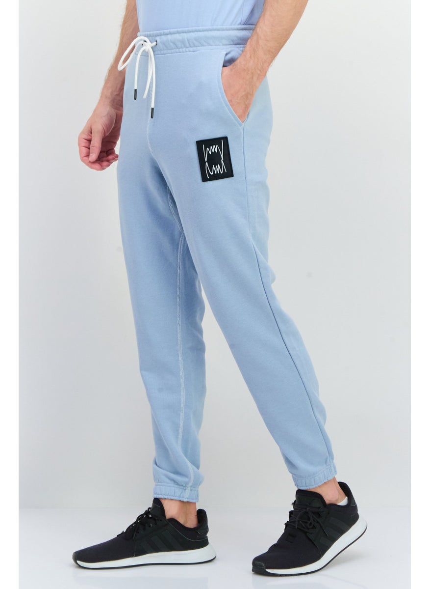 PUMA Men Sportswear Fit Outdoor Sweatpants, Light Blue  - Image 2