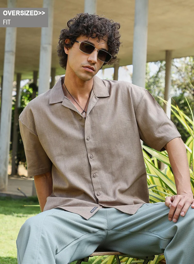 Campus Sutra Campus Sutra Men's Tortilla Brown Solid Resort Oversized Shirt For Casual Wear | Cuban Collar | Short Regular Sleeves | Button Closure | Oversized Shirt Crafted With Comfort Fit For Everyday Wear