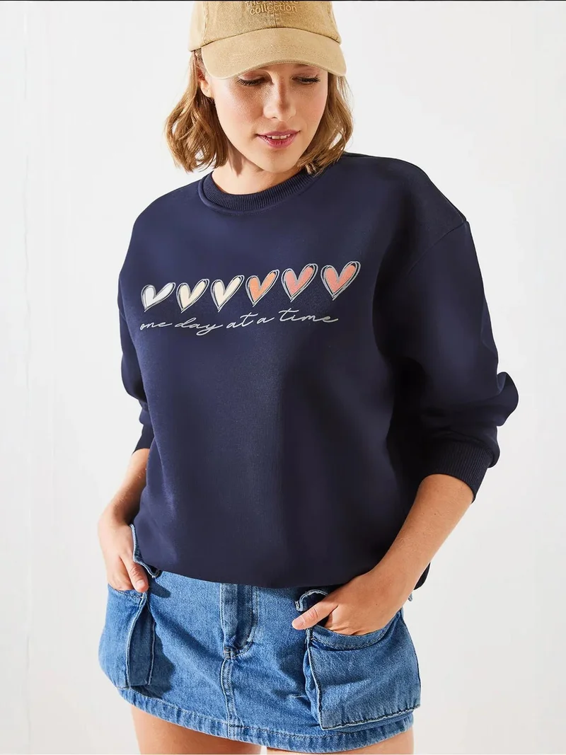 بيانكو لوتشي بلوفر لوكسي بياقة دائرية بنقشة قلب