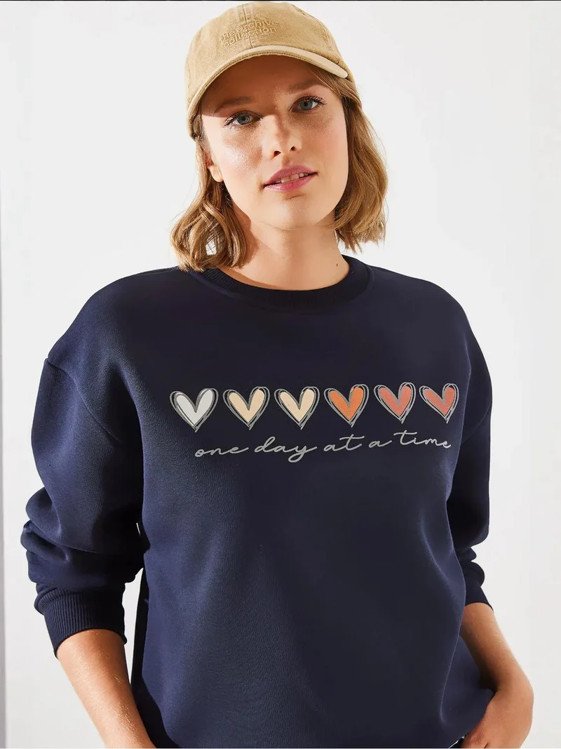 بيانكو لوتشي بلوفر لوكسي بياقة دائرية بنقشة قلب