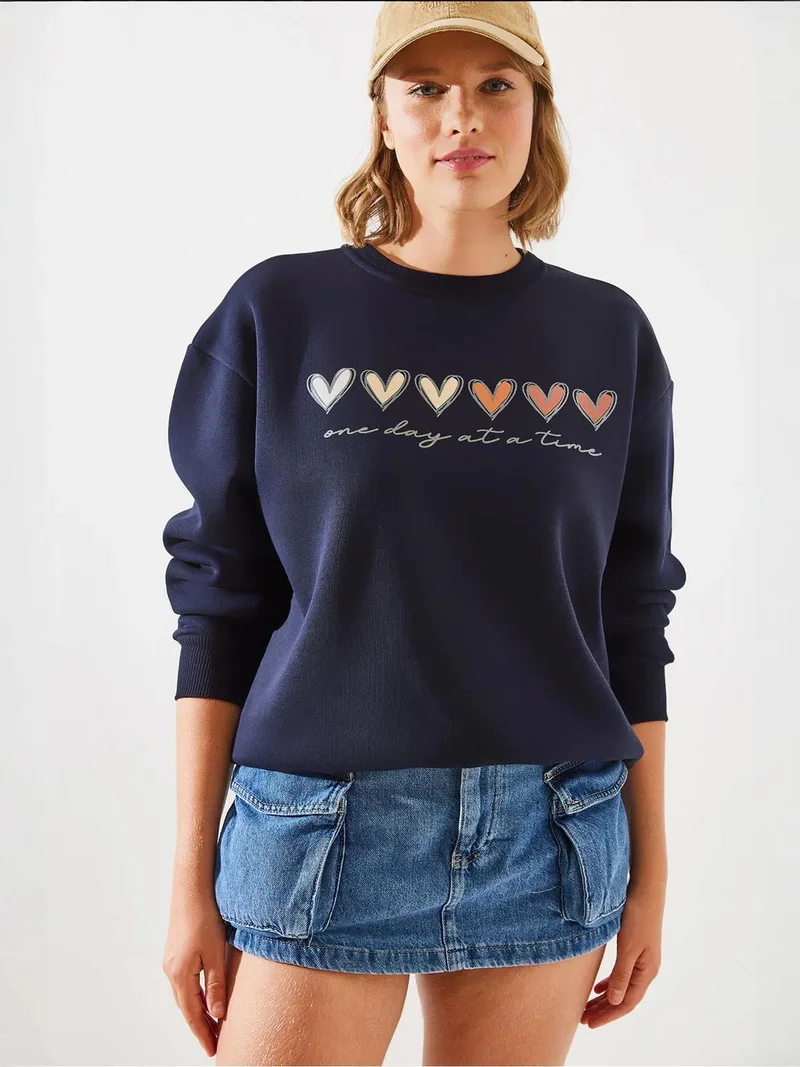 Bianco Lucci LUCCI Heart Patterned Crew Neck Sweatshirt
