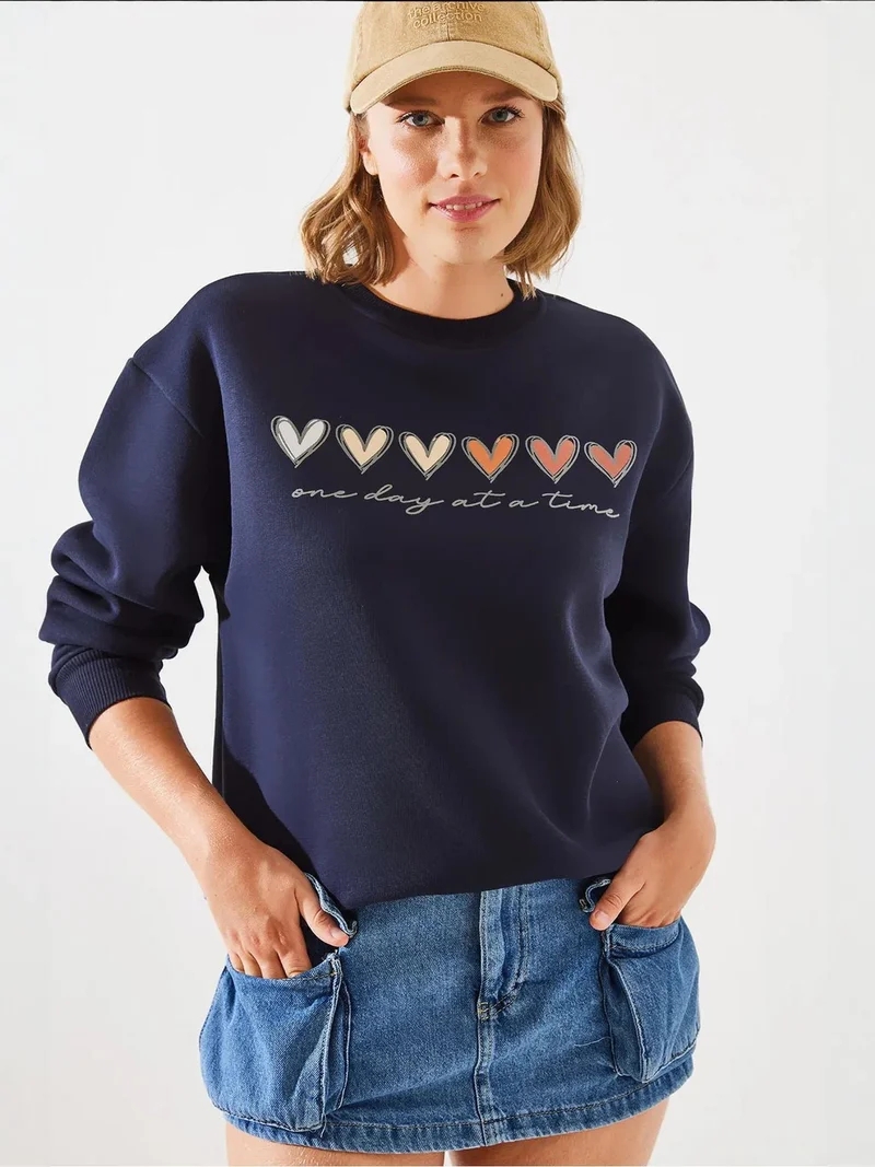 Bianco Lucci LUCCI Heart Patterned Crew Neck Sweatshirt