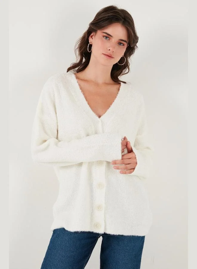 ليلا كارديجان نسائي من ليلا بقصة واسعة وأكمام طويلة وياقة على شكل حرف