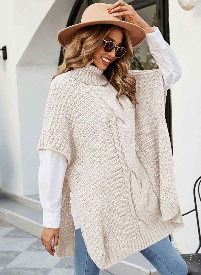 يونيكي Beige  Cable Knit Turtle Neck Long Sleeves Longline Poncho