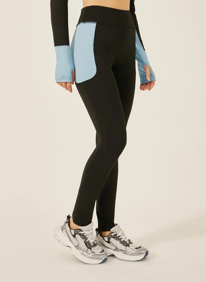 Styli Active  Color Block Half Zip Thumbhole Top and Legging Set for Women | Best Price UAE