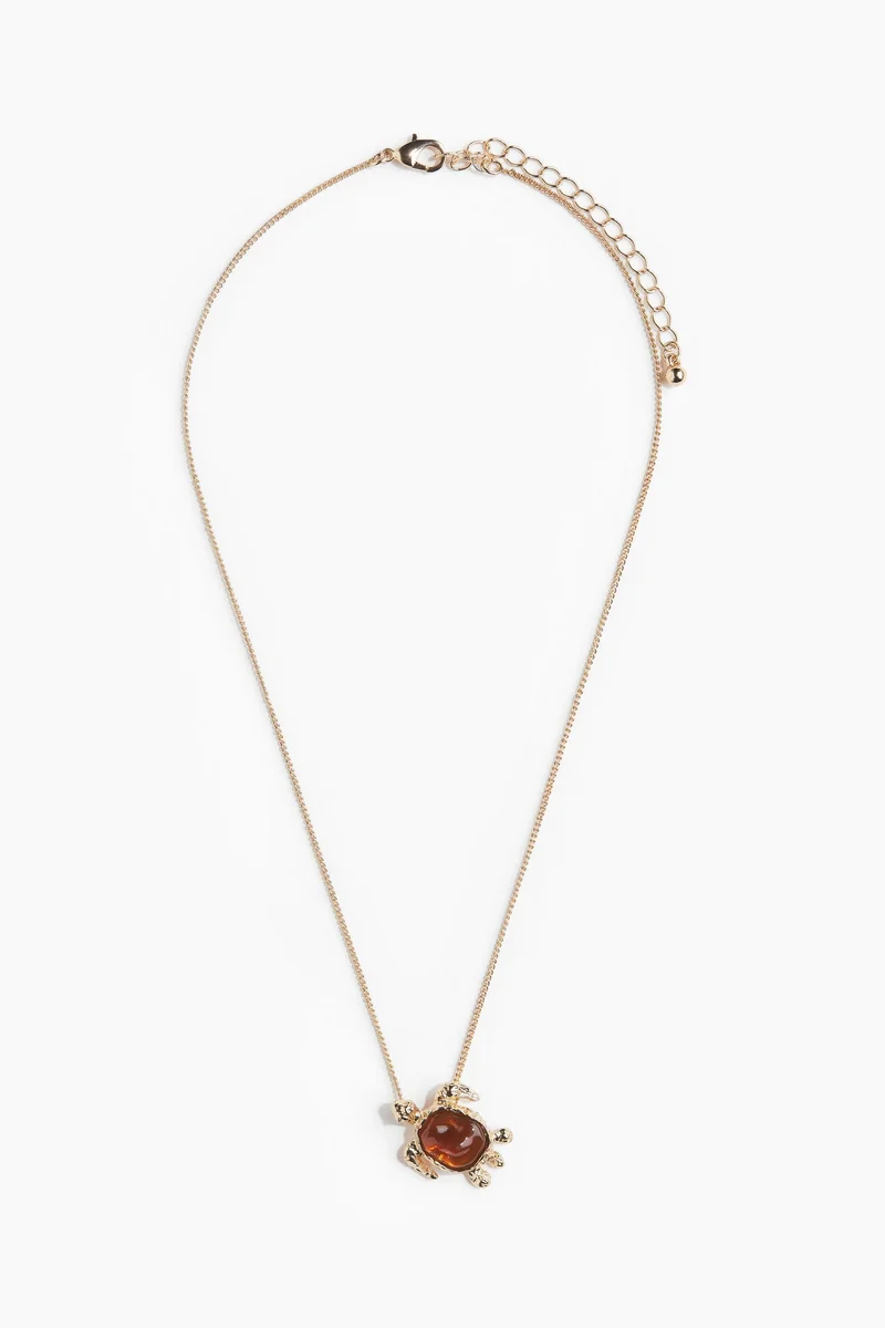 اتش اند ام قلادة مزينة بحلية