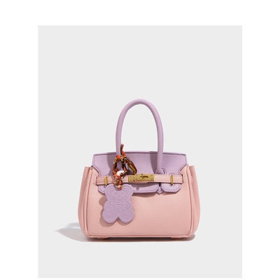 Summer Fresh pink Kelly bag advanced feeling Tong Qin handbag bag female 2022 new contrast color Western style small bag Purple pink