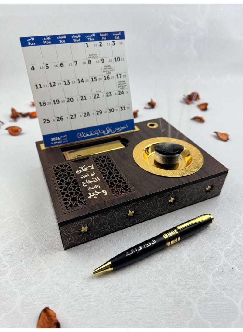 Samrix Luxury Calendar Box 2026: A luxurious calendar with a wooden base containing a compartment for oud (5 grams of enhanced Moroccan oud), an incense burner, a luxury pen engraved with a name, and a paper calendar (Gregorian and Hijri). ✔ Elegant wooden design, luxurious calendar box ✔ Practical Gregorian and Hijri calendar ✔ High-quality enhanced Moroccan oud ✔ Luxury pen engraved with a name ✔ Elegant incense burner for everyday use ✔ Versatile wooden base ✔ Ideal for formal gifts ✔ Suitable for offices and homes ✔ Combines luxury and practicality ✔ A lasting and memorable gift ✔ Sophisticated design suitable for all occasions ✔ An ideal choice for companies and managers - Image 1