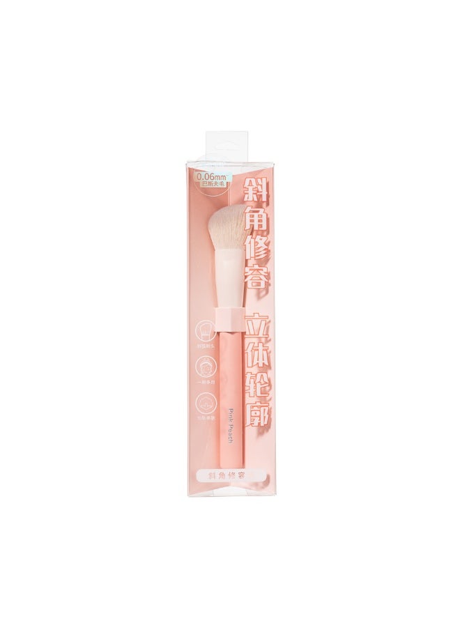 Miniso - Sculpt and define with this peach pink slanted contour brush for flawless makeup application. - Image 1