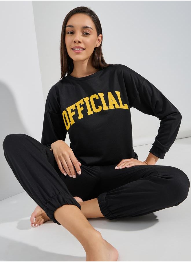 Styli Official Slogan Long Sleeves Top & Joggers Lounge Set  - Image 1