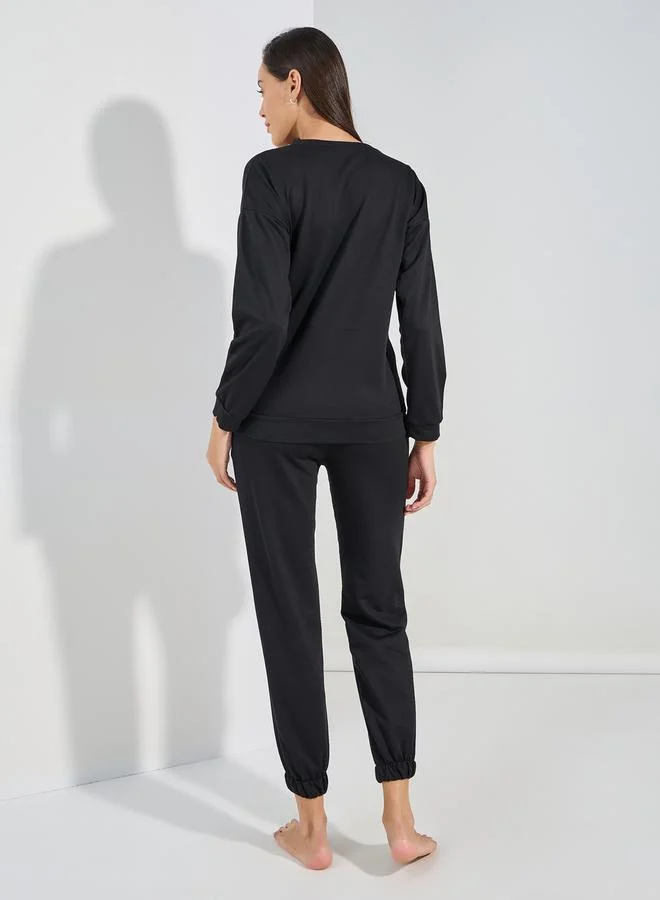 Styli Official Slogan Long Sleeves Top & Joggers Lounge Set