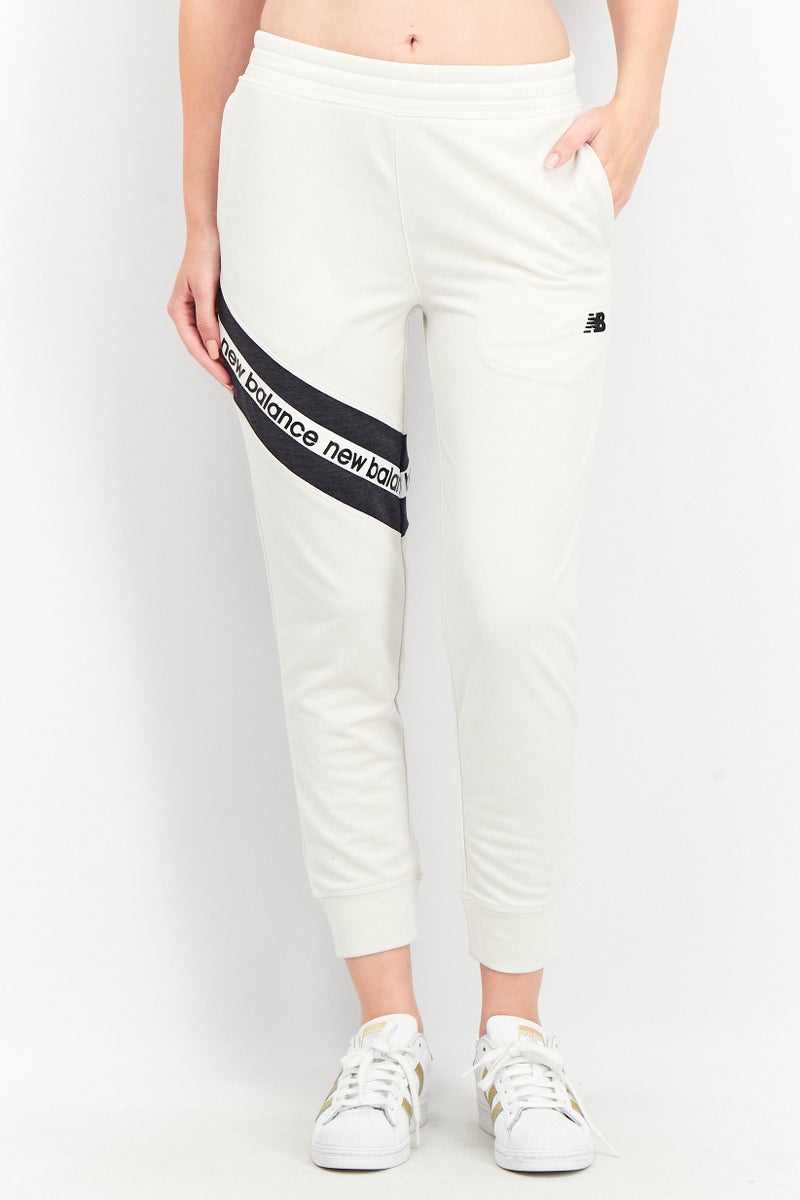 New Balance Women Athletic Fit Training Jogger Pants, Beige Combo  - Image 1
