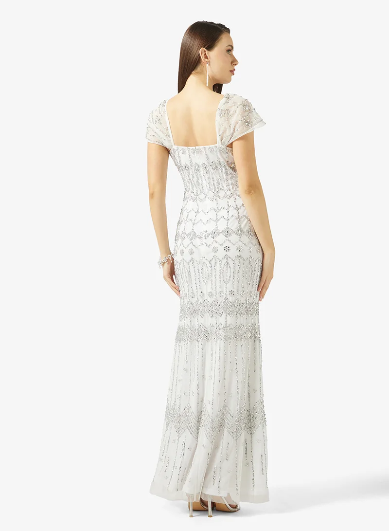 نمشي x فستان سهرة مزين بالخرز