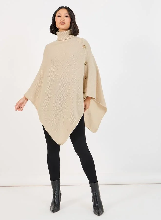 ستايلي سويتر فضفاض بنمط كيب مع أزرار