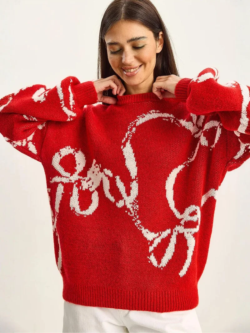 بيانكو لوتشي كنزة صوفية كبيرة الحجم بطبعة وياقة دائرية من لوتشي