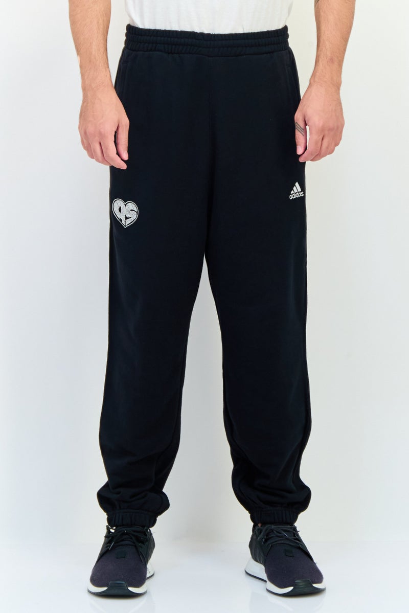 Adidas Men Sportswear Fit Outdoor Jogger Pants, Black - Image 1