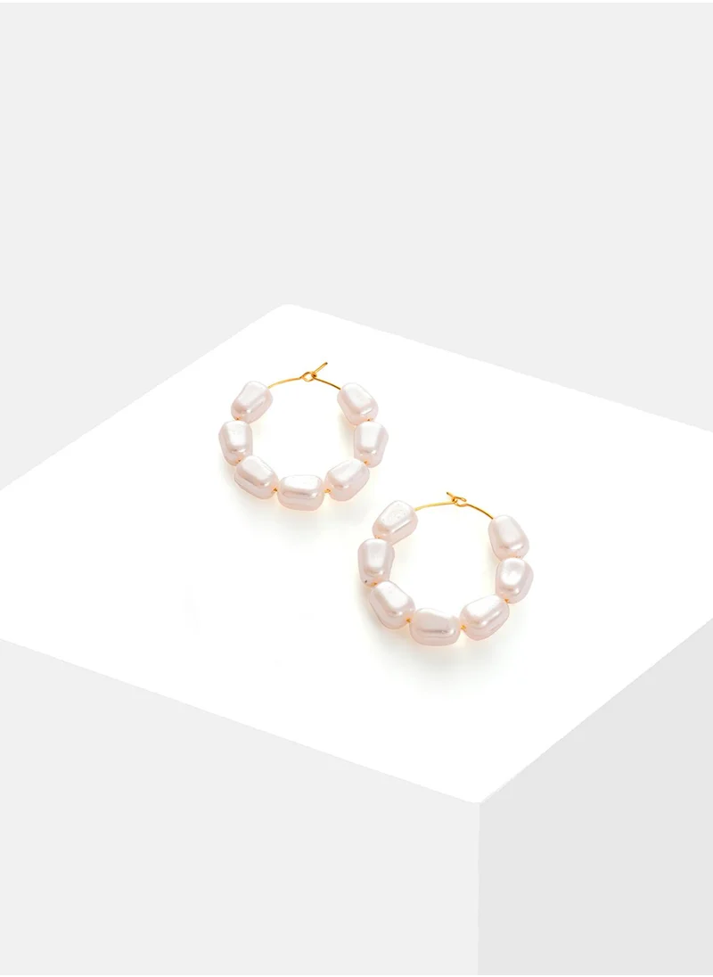 SOHI White Contemporary Hoop Earrings