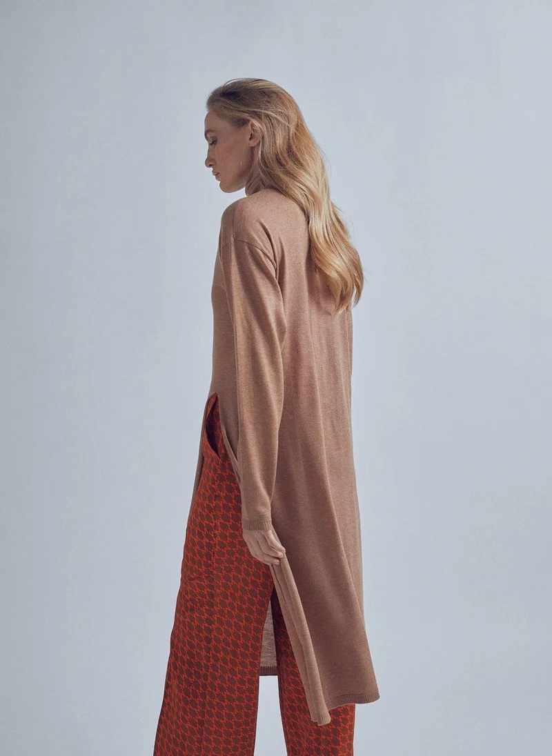 Lola Casademunt Long sweater with a high collar and slit detail