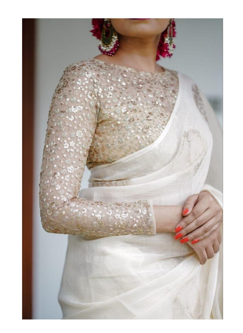 Grab Mantra - Linen Cotton Off White Golden Weaving Design Sari With Golden Sequence Work Unstitched Blouse - Image 1