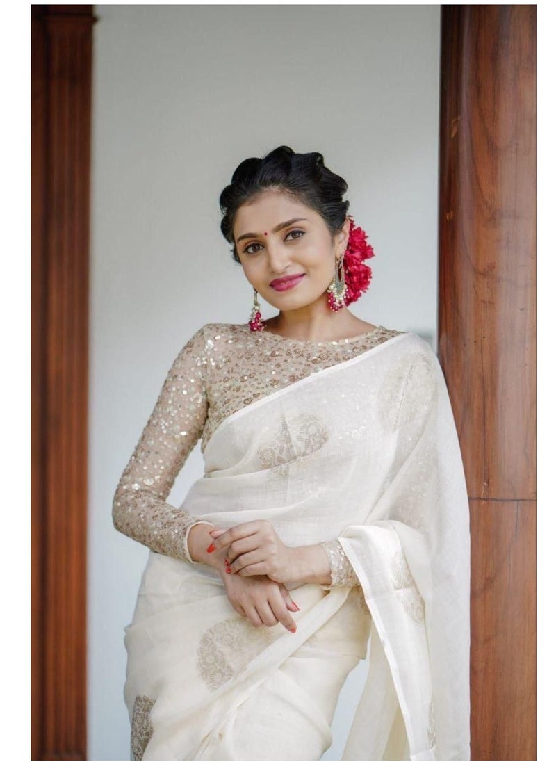 Grab Mantra - Linen Cotton Off White Golden Weaving Design Sari With Golden Sequence Work Unstitched Blouse - Image 1