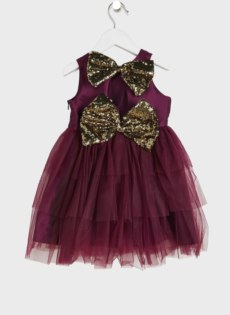 Pinata Party Wear Layered Dress With Bow Detailing On Waist