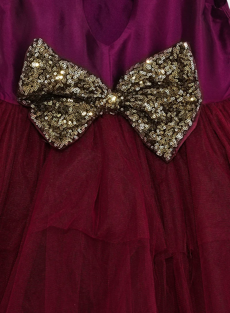 Pinata Party Wear Layered Dress With Bow Detailing On Waist