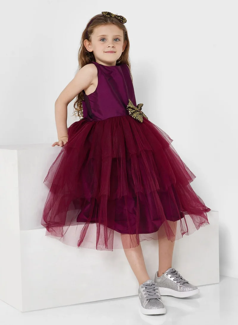 Pinata Party Wear Layered Dress With Bow Detailing On Waist