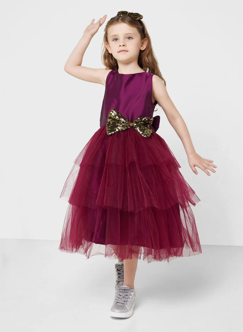 Pinata Party Wear Layered Dress With Bow Detailing On Waist