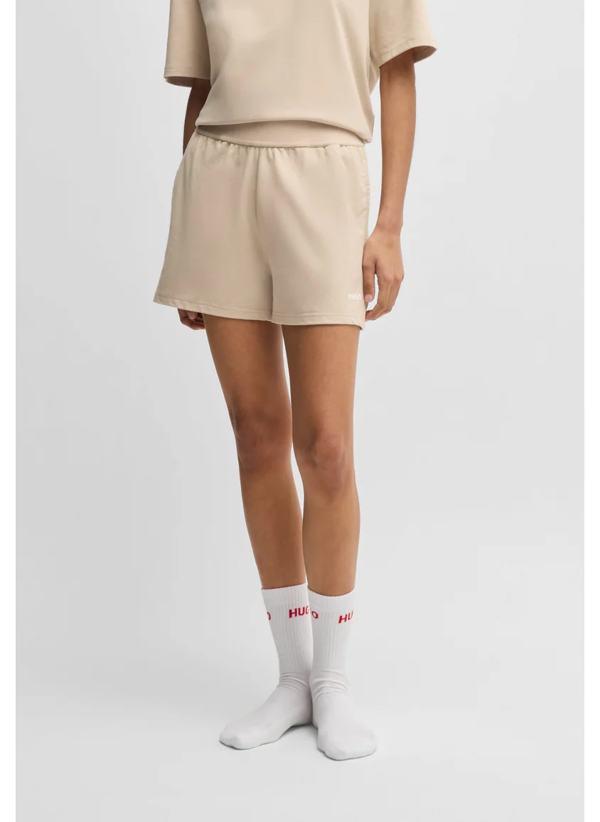 هوجو Relaxed-fit shorts in stretch jersey with printed logo