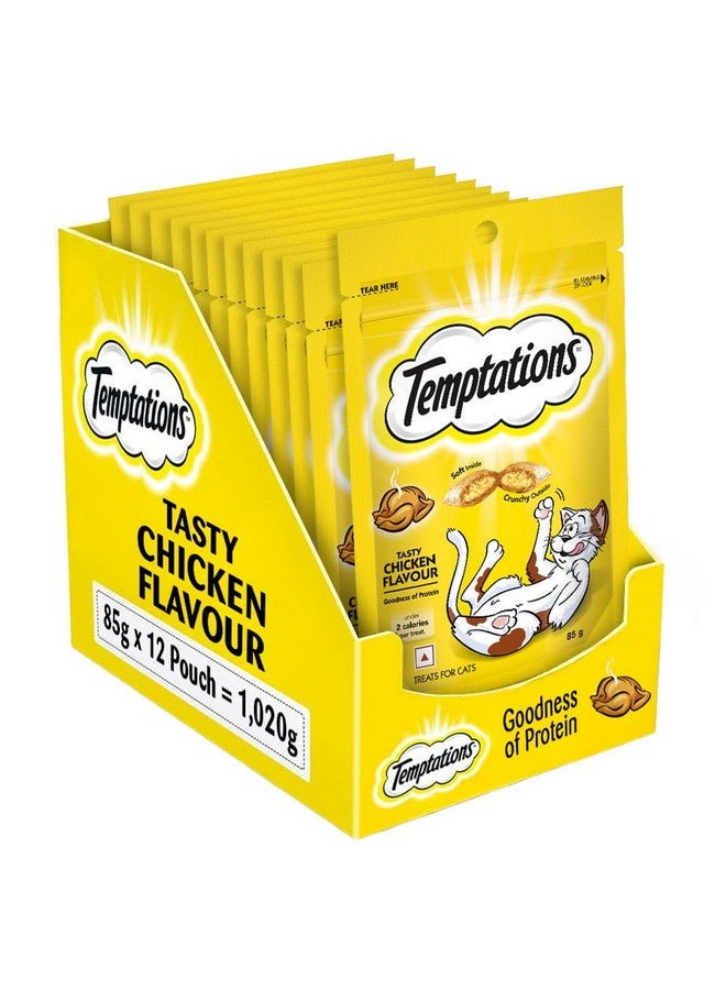 Temptations وجبات خفيفة مقرمشة للقطط من تمبتيشنز، بنكهة دجاج لذيذة، 85 جرام (عبوة من 12)، غنية بالبروتين والفيتامينات والمعادن، ناعمة من الداخل ومقرمشة من الخارج - Image 1