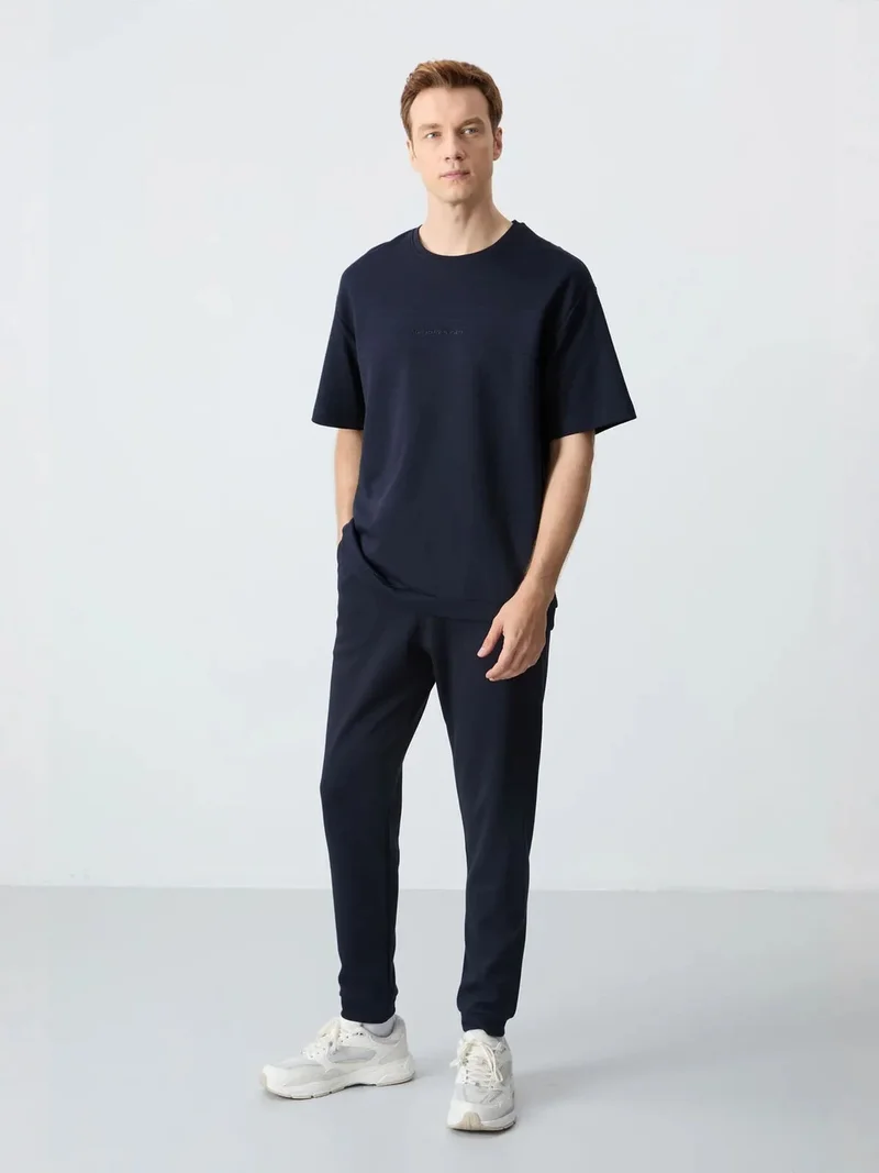 تومي لايف TOMMY Men's Oversized T-shirt And Pants Set
