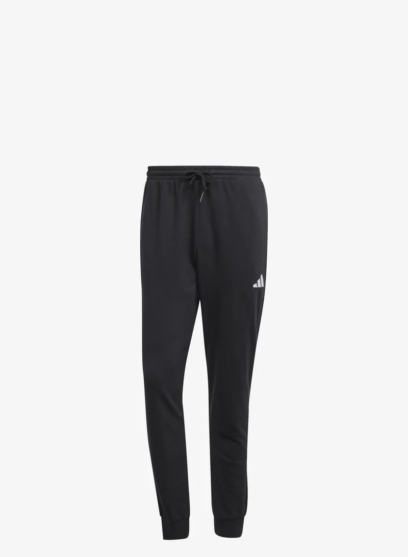 اديداس بنطال Essentials Feel Cozy من الوبر الفرنسي مريح.