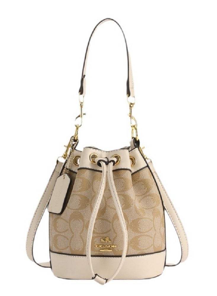 كوتش اوت ليت حقيبة دلو صغيرة من قماش Coach Signature - Image 2