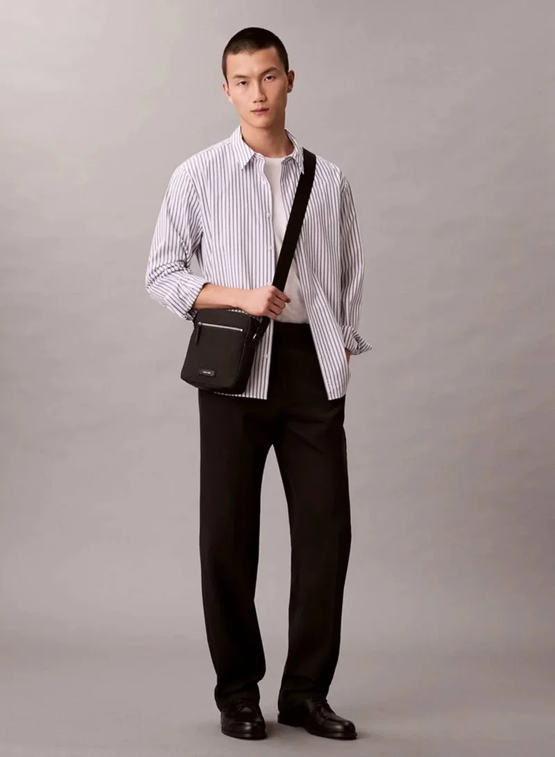Calvin Klein Black Embossed Woven Reporter Bag for Men | Best Price UAE
