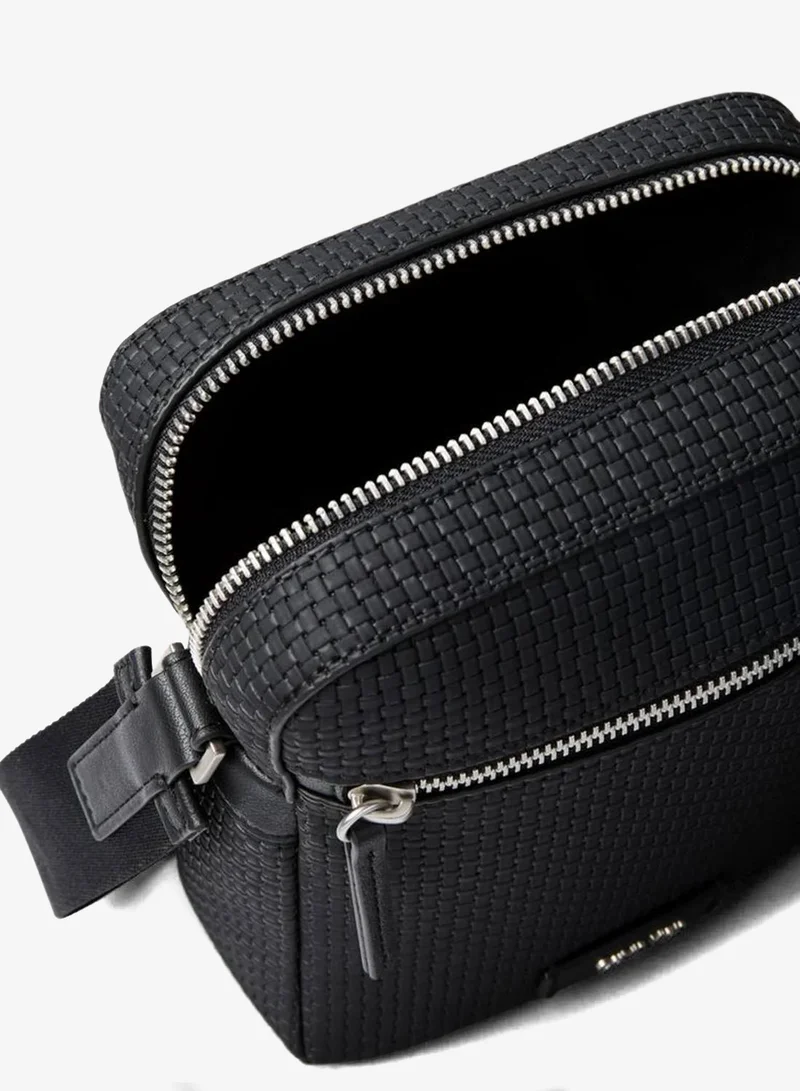 Calvin Klein Black Embossed Woven Reporter Bag for Men | Best Price UAE