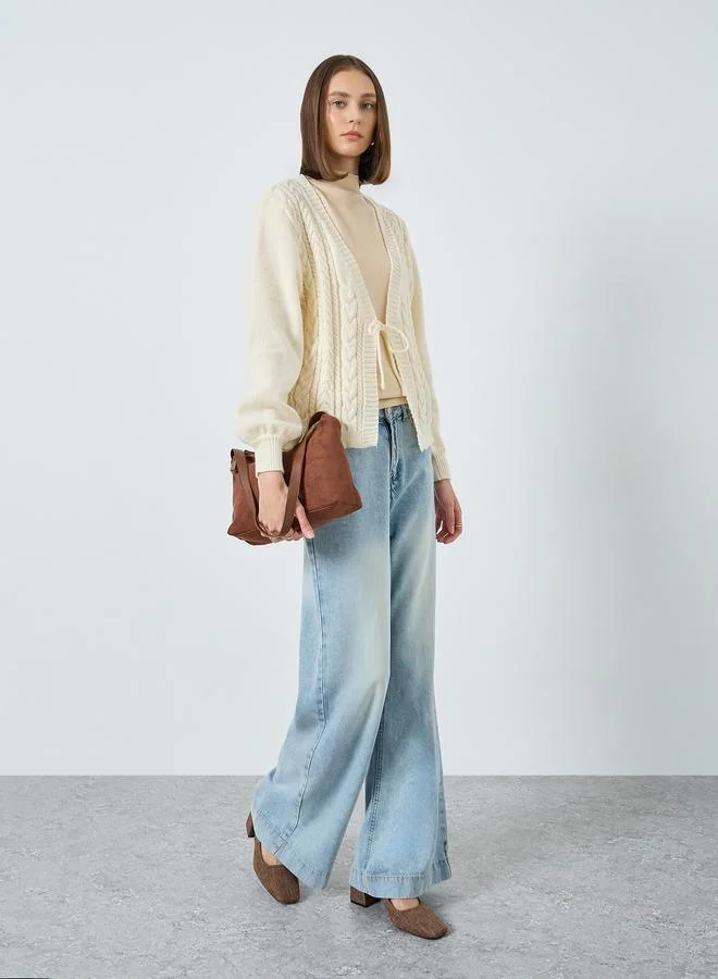 ستايلي كارديجان محبوك بقصة بوكسي مع أربطة