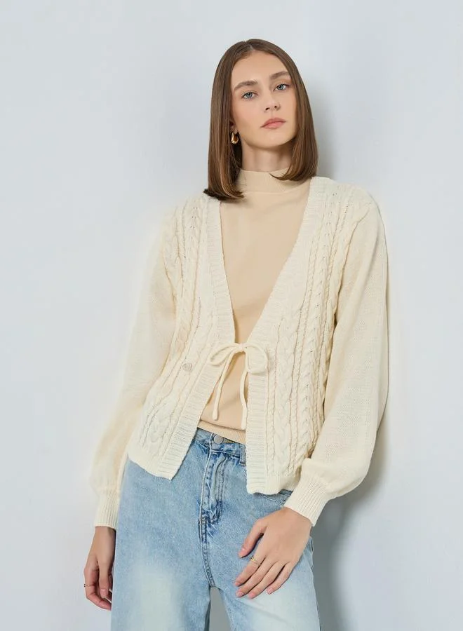 ستايلي كارديجان محبوك بقصة بوكسي مع أربطة