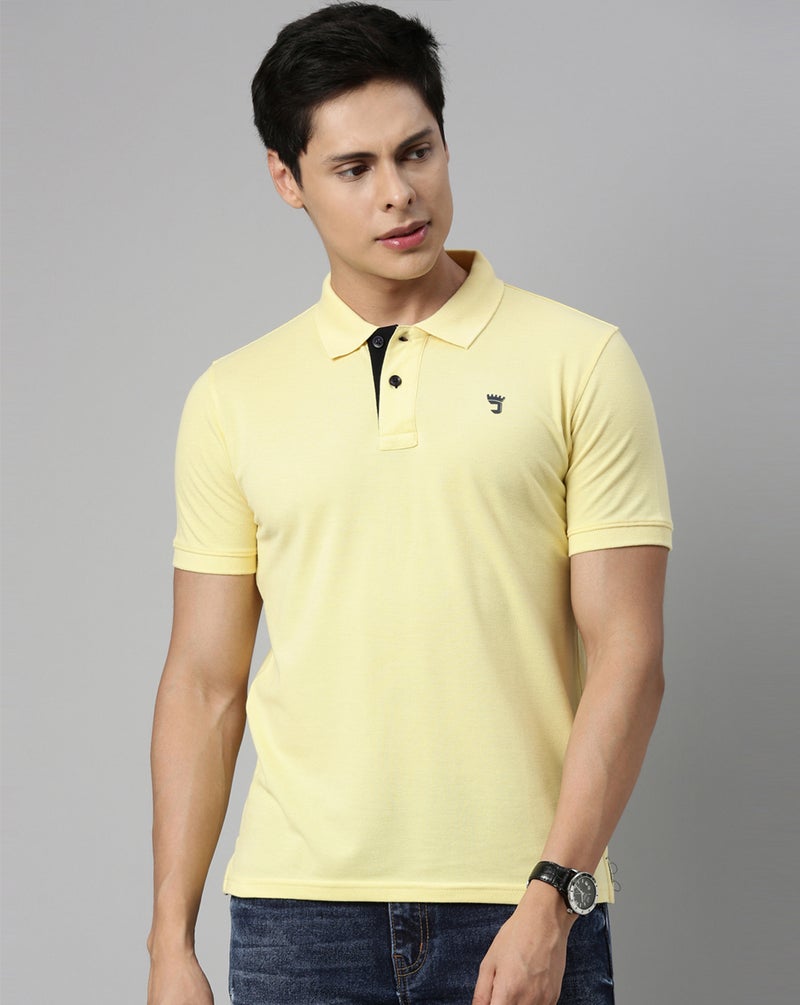 Joven Men Yellow Solid Polo Collar Pure Cotton T-Shirt - Image 1