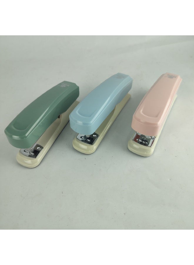 Medium-sized multi-colored stapler with staple box - Image 1