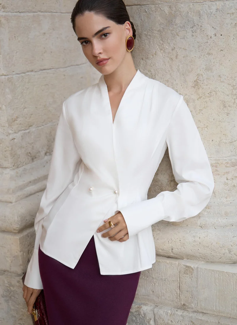 Lichi Fitted wrap blouse